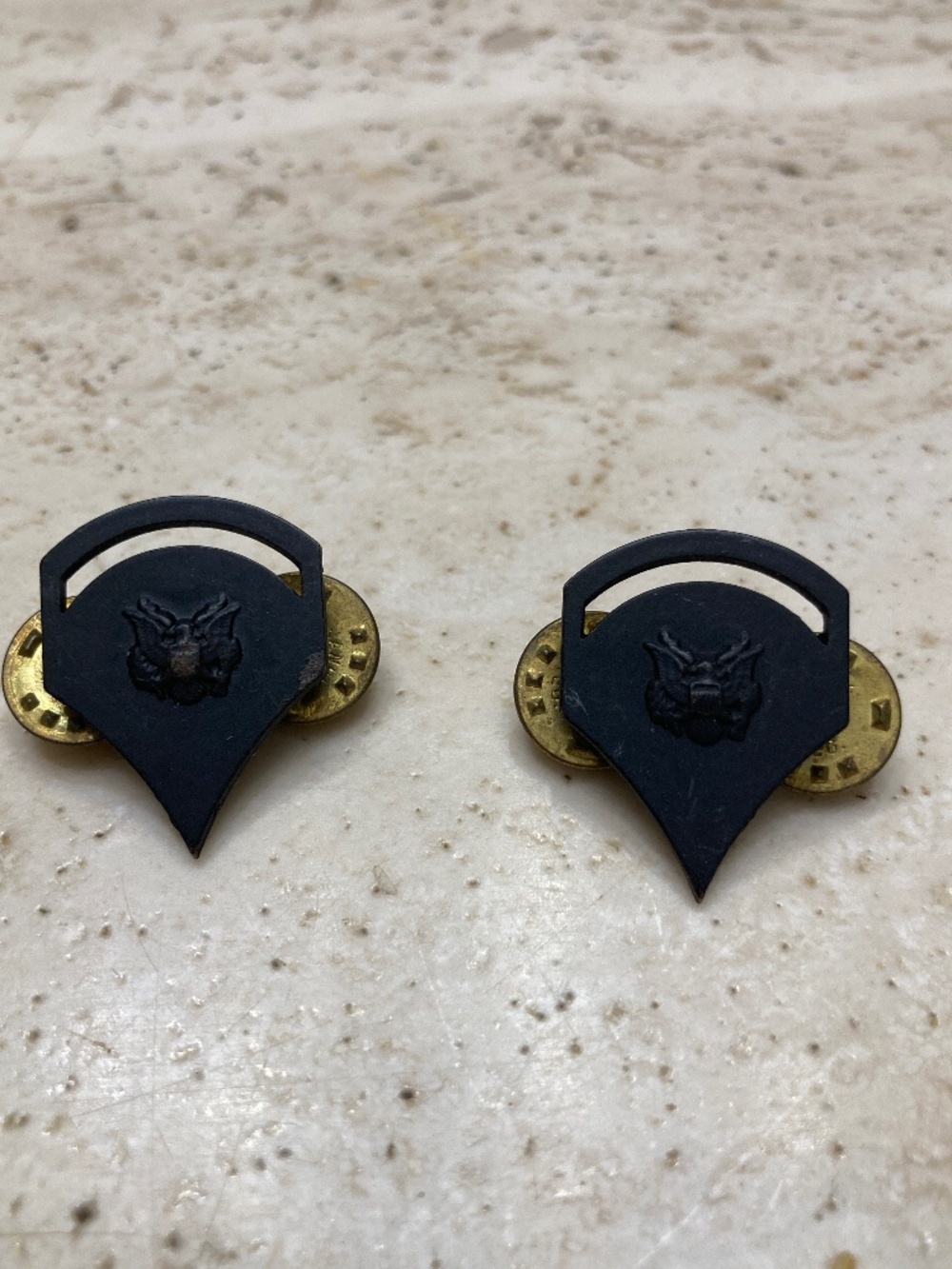 Two Black ARMY SPC-5 Rank Pins